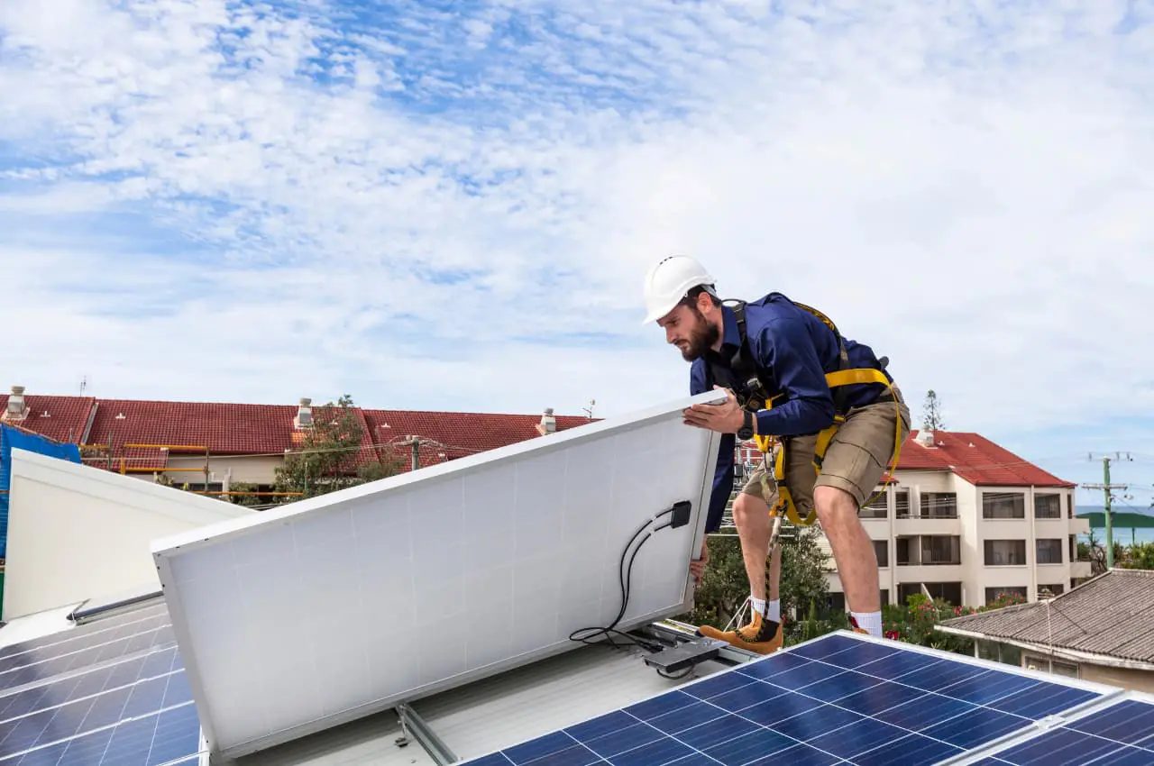 A man working with Solar panels