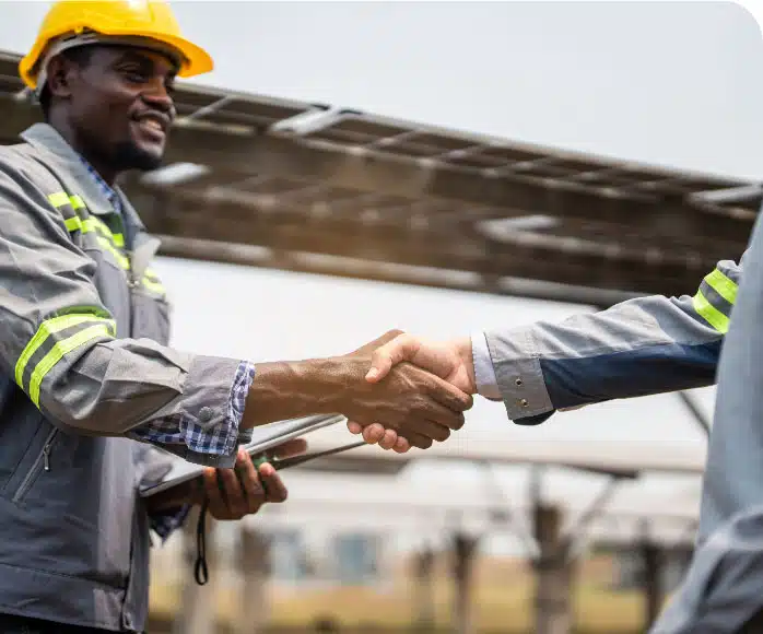 satisfied solatrue customer shaking hands with solatrue energy team
