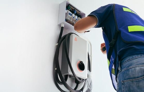 local expert Certified male Electrician Installing Home EV Charger